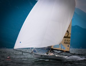 Hungarian 18ft skiff team Be Light! flying downwind past the Hartas Productions sailing photographer